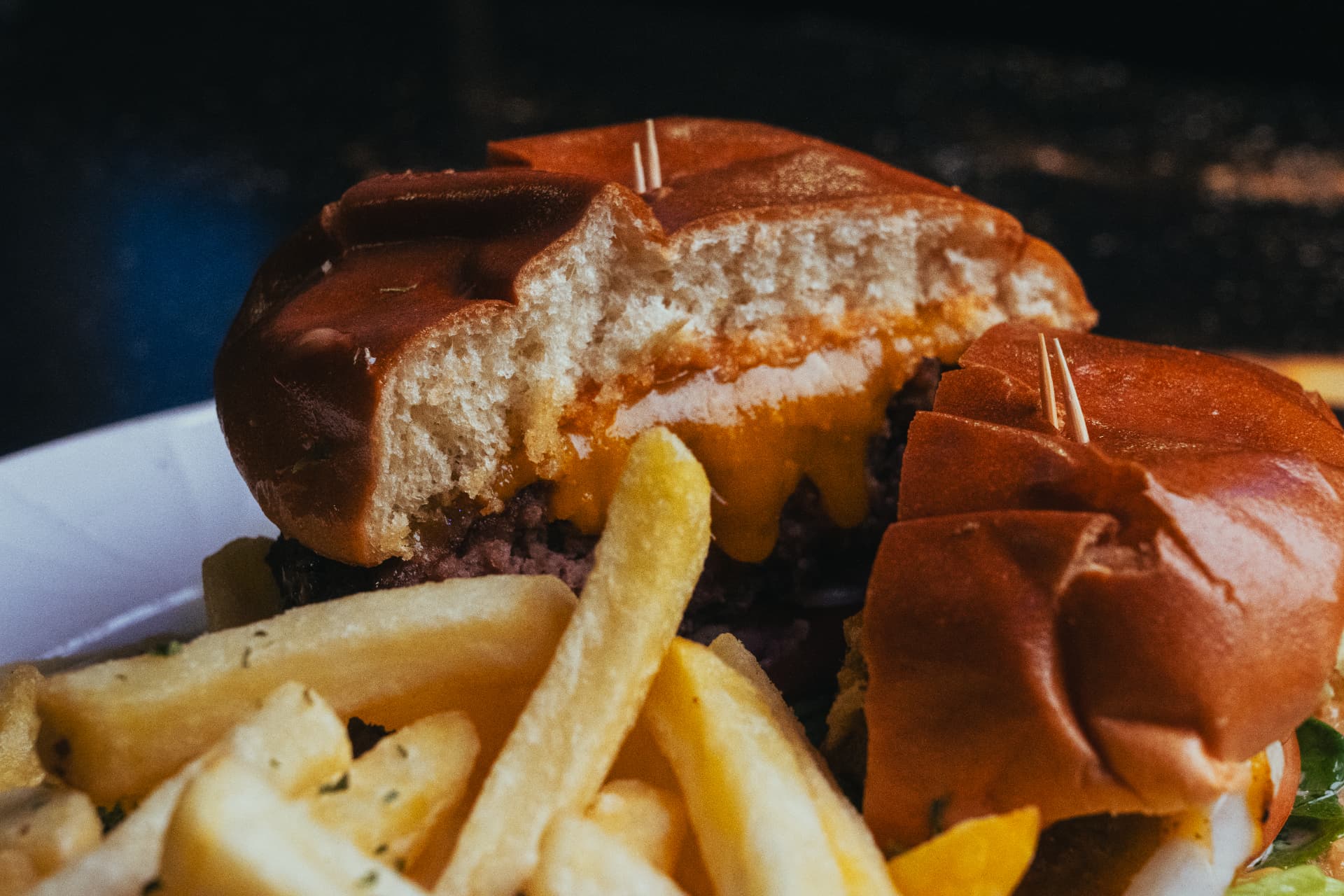 Close-up of a cheeseburger and fries at Joey's Restaurant