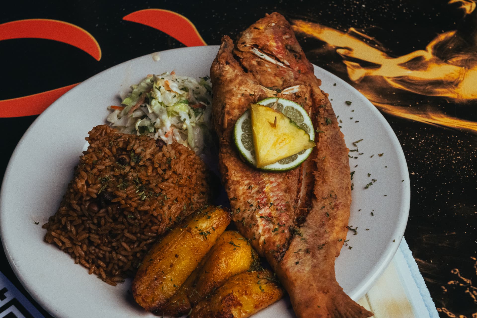 Fried snapper with peas and rice and plantain at Joey's Restaurant